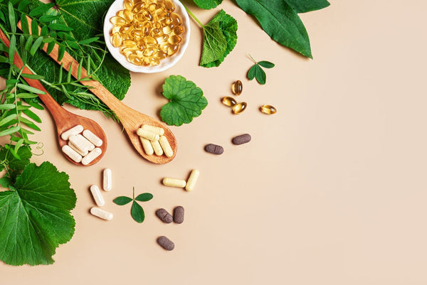 An overhead image of multiple health benefit items such as supplement capsules and ingredients.