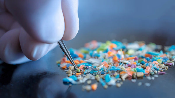 Macro shot of doctor examining toxic microplastics.